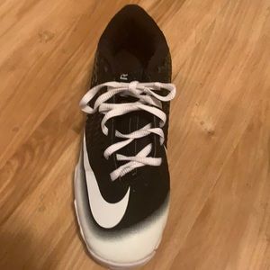 Nike cleats and they are black and white, only 35$